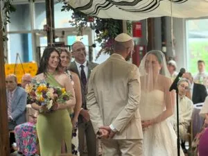 Rabbi Amy officiating Jamie and Ross's wedding ceremony, niboca.org