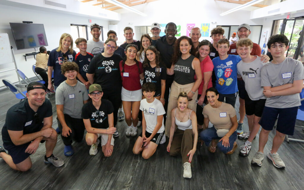 Group photo of Neshamah Institute volunteers at the Spring Mitzvah Fair at SOS Children's Village in Coconut Creek, niboca.org