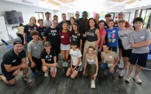 Group photo of Neshamah Institute volunteers at the Spring Mitzvah Fair at SOS Children's Village in Coconut Creek, niboca.org