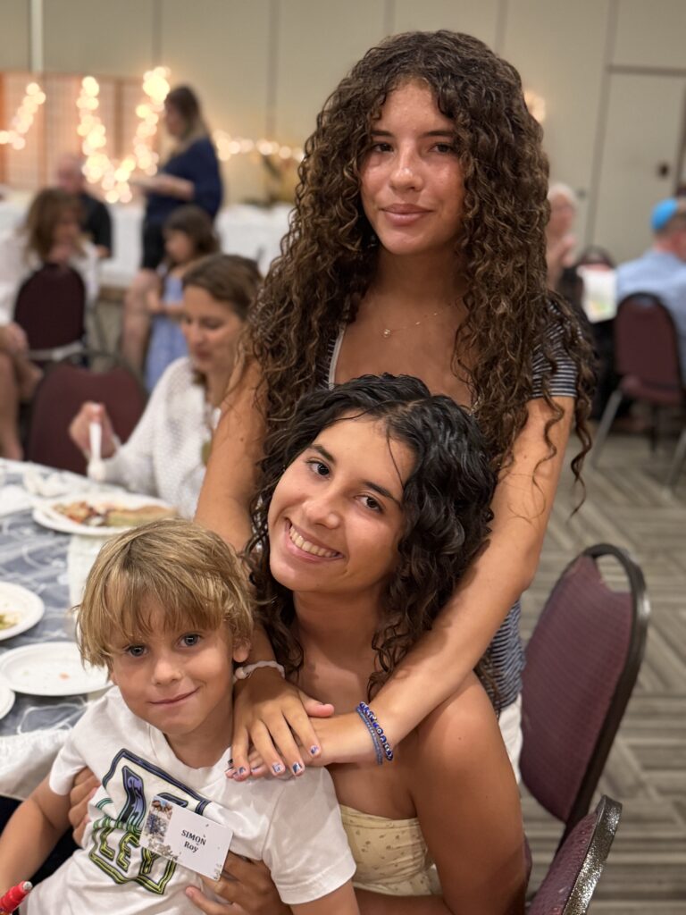 Kids enjoying Shabbat service together at Neshamah Institute in Boca Raton