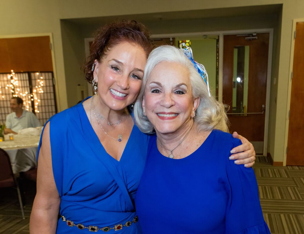 Grandparents celebrating their grandchild's bat mitzvah after the gift of Jewish learning, niboca.org
